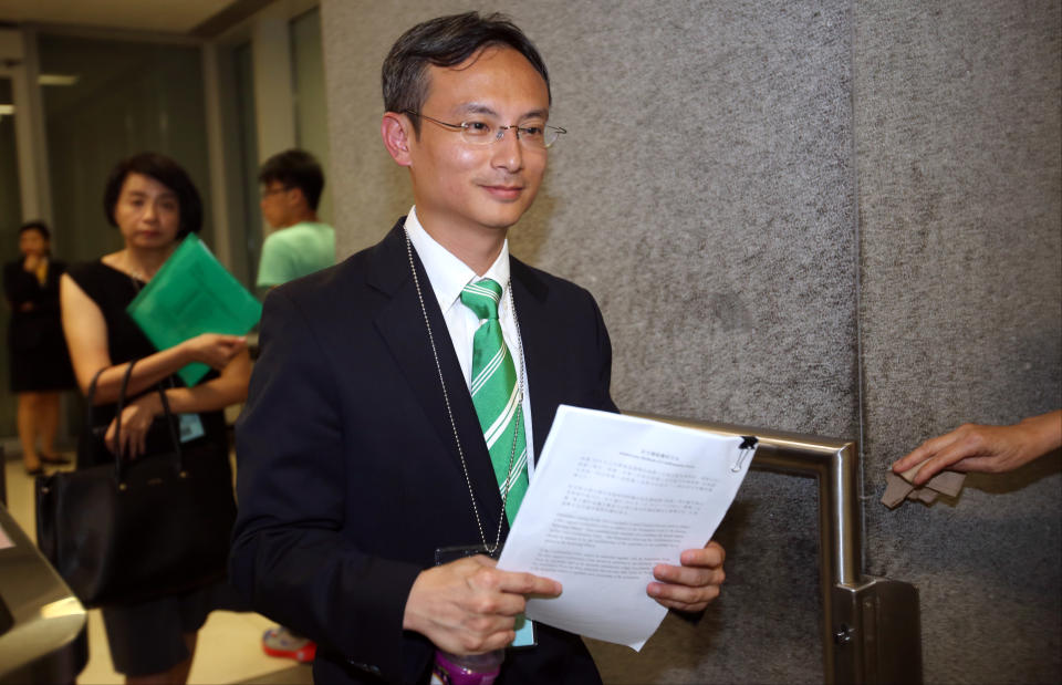 Dr Pierre Chan Pui-yin, former president of the Public Doctors' Association, submits his application to run in the Legco election outside CGO in Tamar. 26JUL16 SCMP/Edward Wong (Photo by Edward Wong/South China Morning Post via Getty Images)