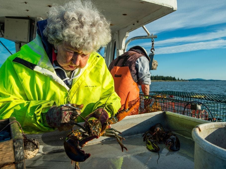 A centenarian working on a lobster boat in Maine