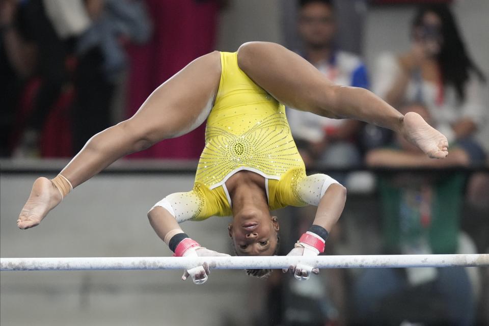 Brazil's Rebeca Andrade competes in the women's gymnastics uneven bars exercise final at the Pan American Games in Santiago, Chile, Tuesday, Oct. 24, 2023. (AP Photo/Martin Mejia)