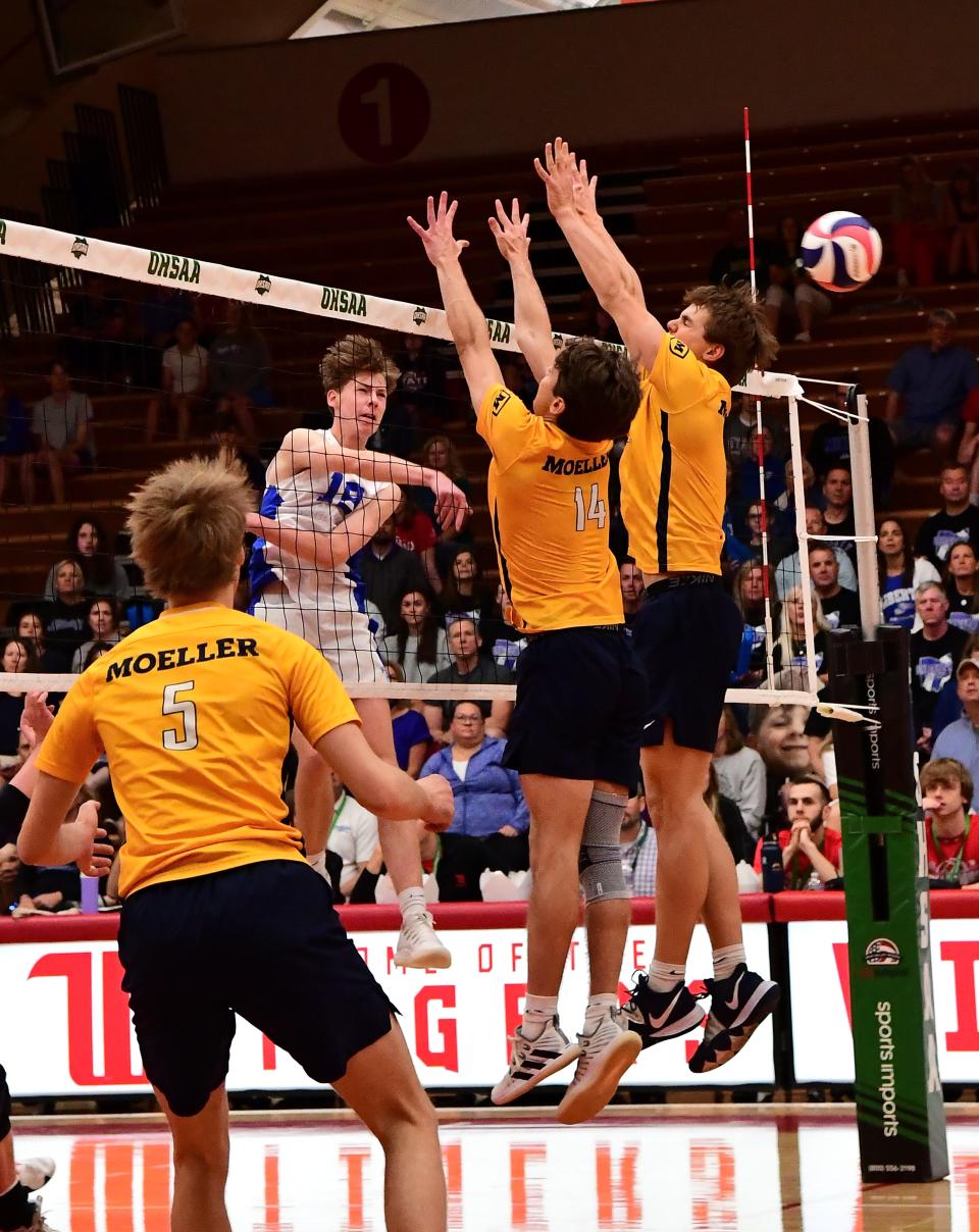 Caden Whiteside spikes and scores during Olentangy Liberty's loss to Cincinnati Moeller in the Division I state final Sunday at Wittenberg.