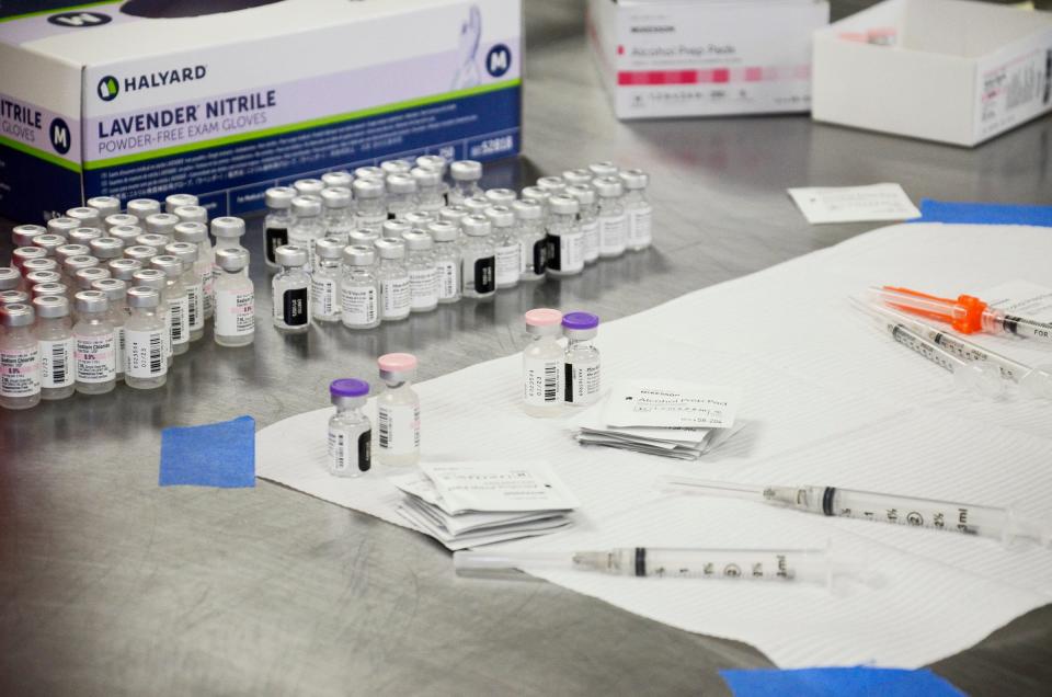 Vials of the Pfizer COVID-19 vaccine are seen during a vaccination clinic at the Emmet County Fairgrounds on May 6, 2021.