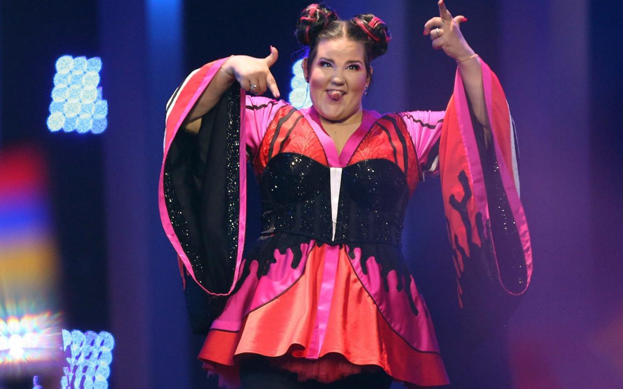 Netta performing onstage in the Eurovision final - AP