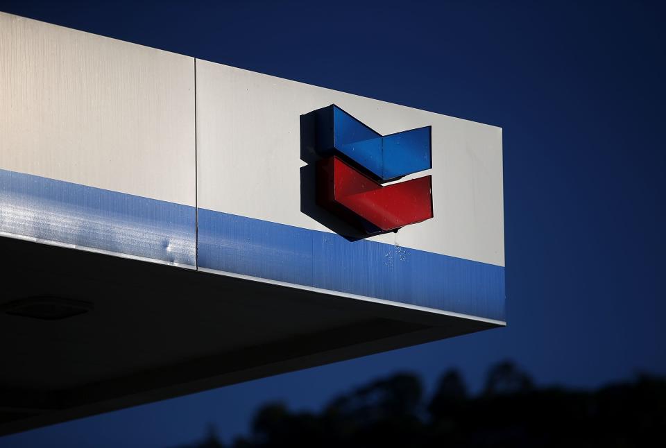 The Chevron logo is displayed at a Chevron station on October 30, 2015 in Greenbrae, California.