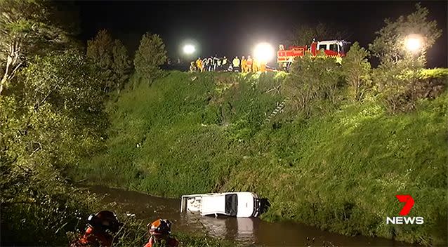 The car slid seven metres down an embankment. Photo: 7 News