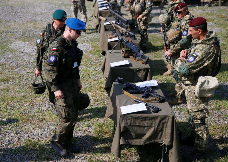 Servicemen from Ukraine, U.S., Poland and Lithuania take part in the "Three Swords-2021" military exercise in Lviv region