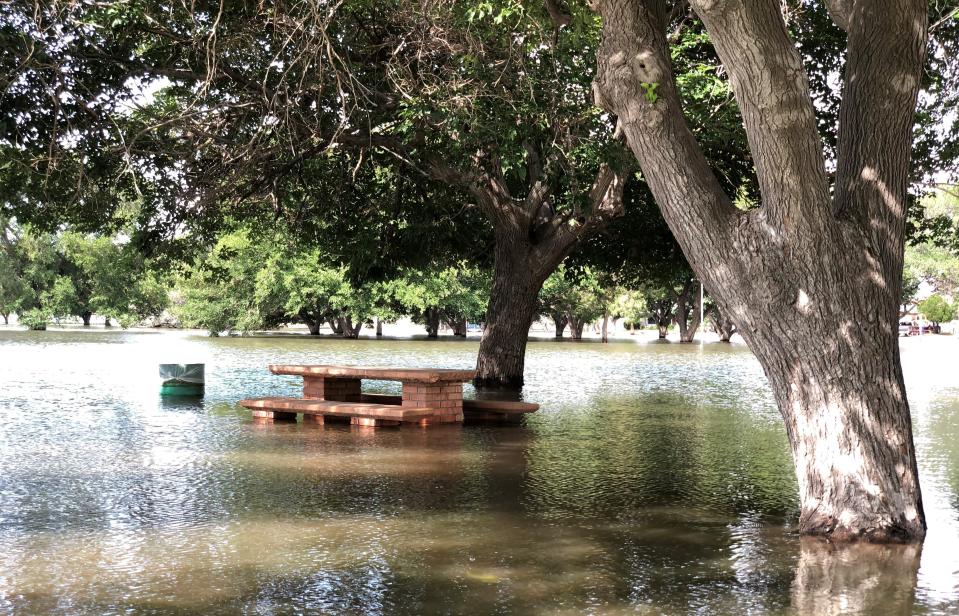 A large portion of Eastwood Park, better known as Album Park, was still covered by water Monday after a massive thunderstorm Sunday dumped rain across El Paso.