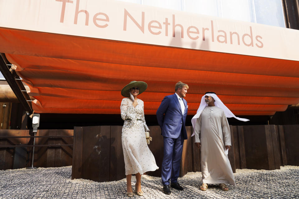 Queen Maxima, King Willem-Alexander and Emirati Tolerance Minister Sheikh Nahyan bin Mubarak Al Nahyan talks at the Netherlands pavilion at Expo 2020 in Dubai, United Arab Emirates, Wednesday, Nov. 3, 2021. King Willem-Alexander and Queen Maxima of the Netherlands are in the United Arab Emirates as part of a royal trip to the country to visit Dubai's Expo 2020. (AP Photo/Jon Gambrell)