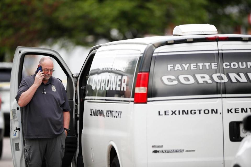Police and Fayette County coroner on the scene of a triple homicide off of Caywood and Alexandria Drives in Lexington, Ky., Wednesday, May 25, 2022.