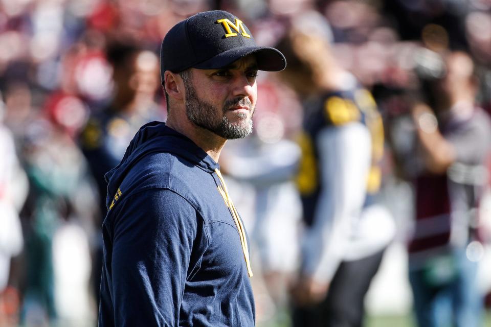 Michigan defensive coordinator Jesse Minter watches warm up ahead of the Rose Bowl game against Alabama at Rose Bowl Stadium in Pasadena, Calif., on Monday, Jan. 1, 2024.