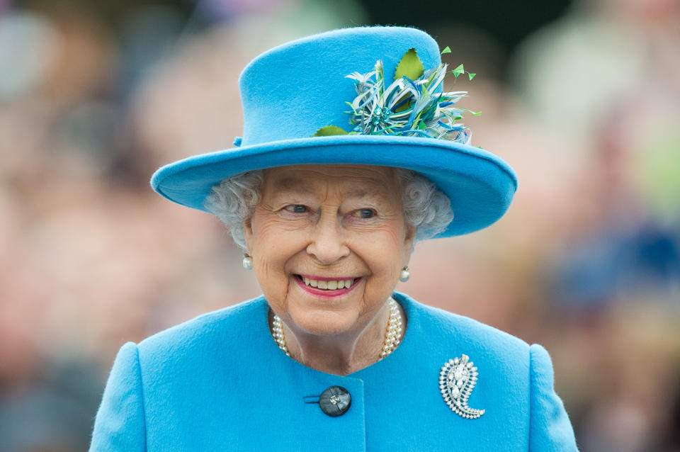 Queen Elizabeth II tours Queen Mother Square on October 27, 2016 in Poundbury, Dorset.  