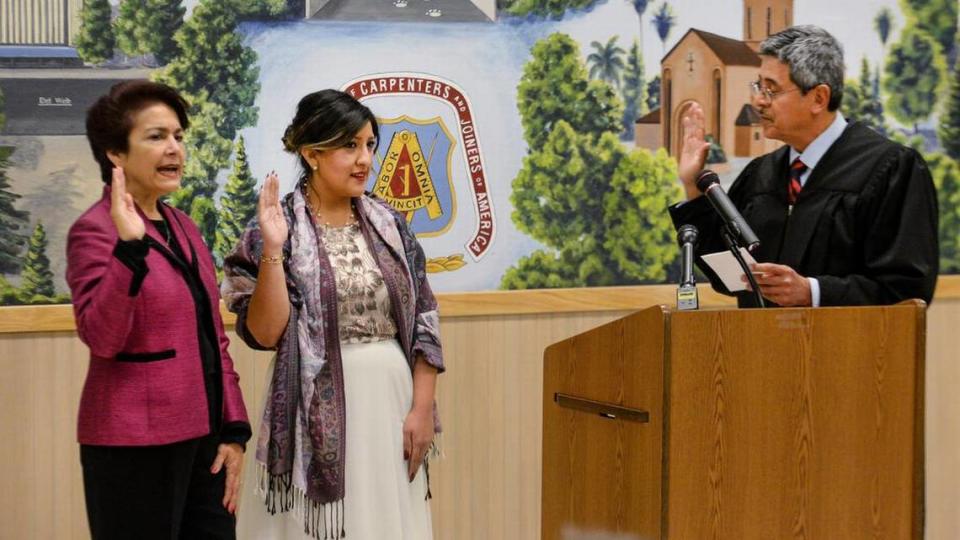 Fifth District Court of Appeal Justice Rosendo Peâ€”a, Jr., swears in California State senators Anna Caballero, left, and Melissa Hurtado during a ceremonial joint community swearing-in ceremony for constituents, family and friends at the Carpenters Local Union 701 building in Fresno on Friday, Jan. 25, 2019.