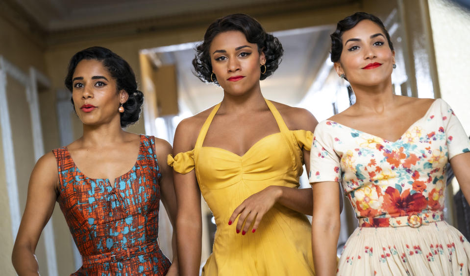 This image released by 20th Century Studios shows, from left, Ilda Mason as Luz, Ariana DeBose as Anita, and Ana Isabelle as Rosalia in "West Side Story." (Niko Tavernise/20th Century Studios via AP)