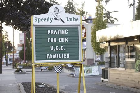 A sign expresses local people's sentiments following a mass shooting at Umpqua Community College in Roseburg, Oregon October 1, 2015. REUTERS/Steve Dipaola