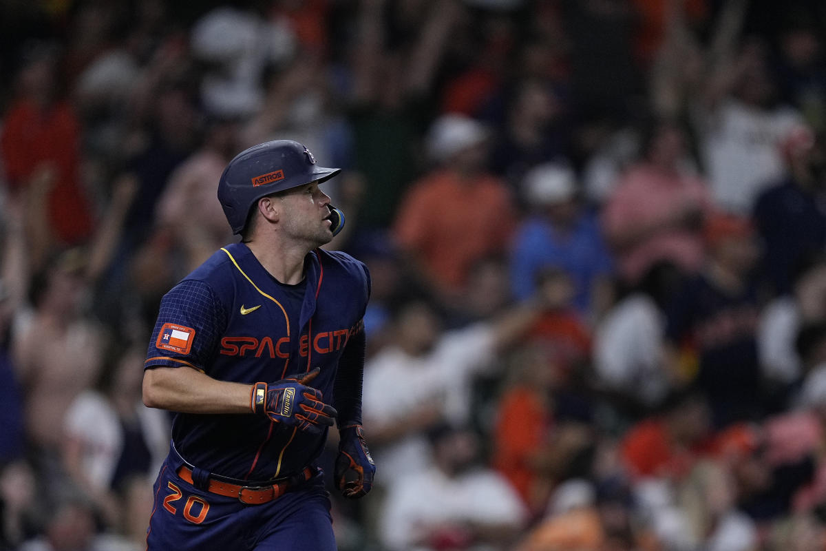 Astros celebrate 5-3 victory over rival Rangers