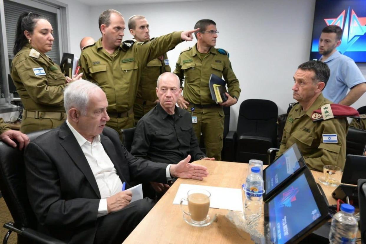 A handout photo made available by the Israeli Government Press Office shows Israeli prime minister Benjamin Netanyahu (L) during a situation assessment meeting in Tel Aviv, Israel (EPA)