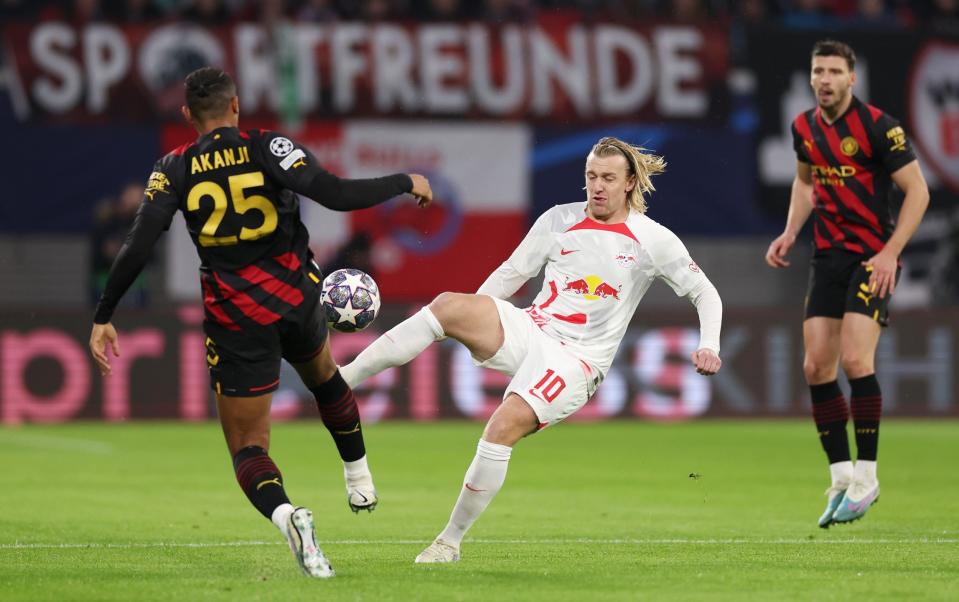 Emil Forsberg of RB Leipzig battles for possession with Manuel Akanji of - Getty Images/Lars Baron