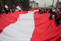 Supporters of socialist Pedro Castillo and right-wing Keiko Fujimori march demanding victory for their respective candidates, in Lima