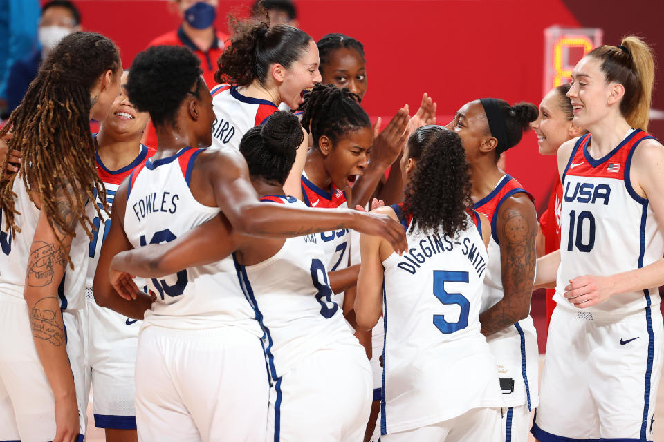 <p>Members of Team United States celebrate after defeating Team Japan 90-75 to win the women's gold medal match between Team United States and Team Japan on day sixteen of the Tokyo 2020 Olympic Games at Saitama Super Arena on August 08, 2021 in Saitama, Japan. (Photo by Abbie Parr/Getty Images)</p> 