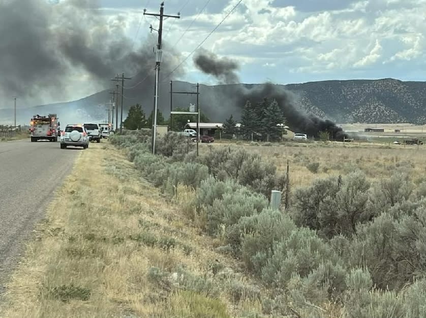 A structure fire in Iron County on Saturday, July 20, 2024, spread to the surrounding area. First responders from several agencies responded to fight the fire. (Courtesy: Iron County Sheriff's Office)