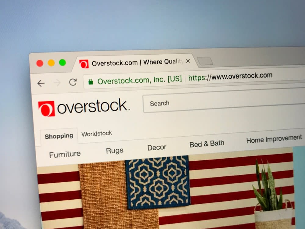 overstock crypto blockchain bitcoin