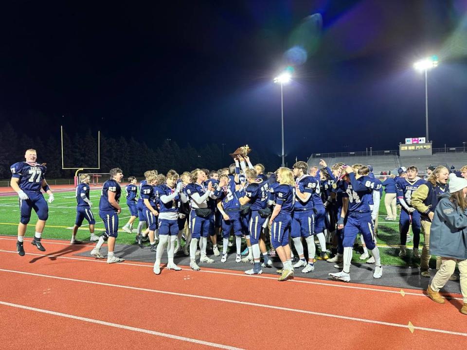 Bald Eagle Area celebrates after beating Richland49-0 to win the District 6 Class 2A title on Saturday at Mansion Park in Altoona. It was the fourth district crown for the program.