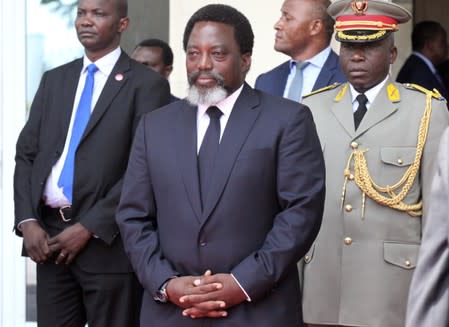 FILE PHOTO: Democratic Republic of Congo's President Joseph Kabila prepares to receive Republic of Congo President Denis Sassou Nguesso and Angola's new President Joao Lourenco at the State House in Kinshasa