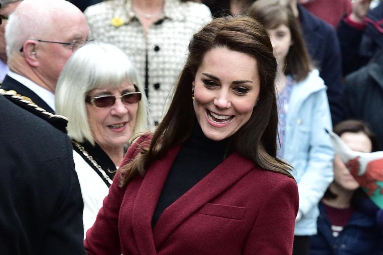 Beaming: The Duchess of Cambridge arriving for a visit: Ben Birchall/PA