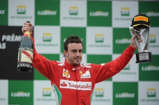 Fernando Alonso celebrates taking second place in the Brazilian Grand Prix in Sao Paulo. Ferrari has insisted that Alonso should have been the man celebrating a third career title, pointing to controversial races in Belgium and Japan to support their argument