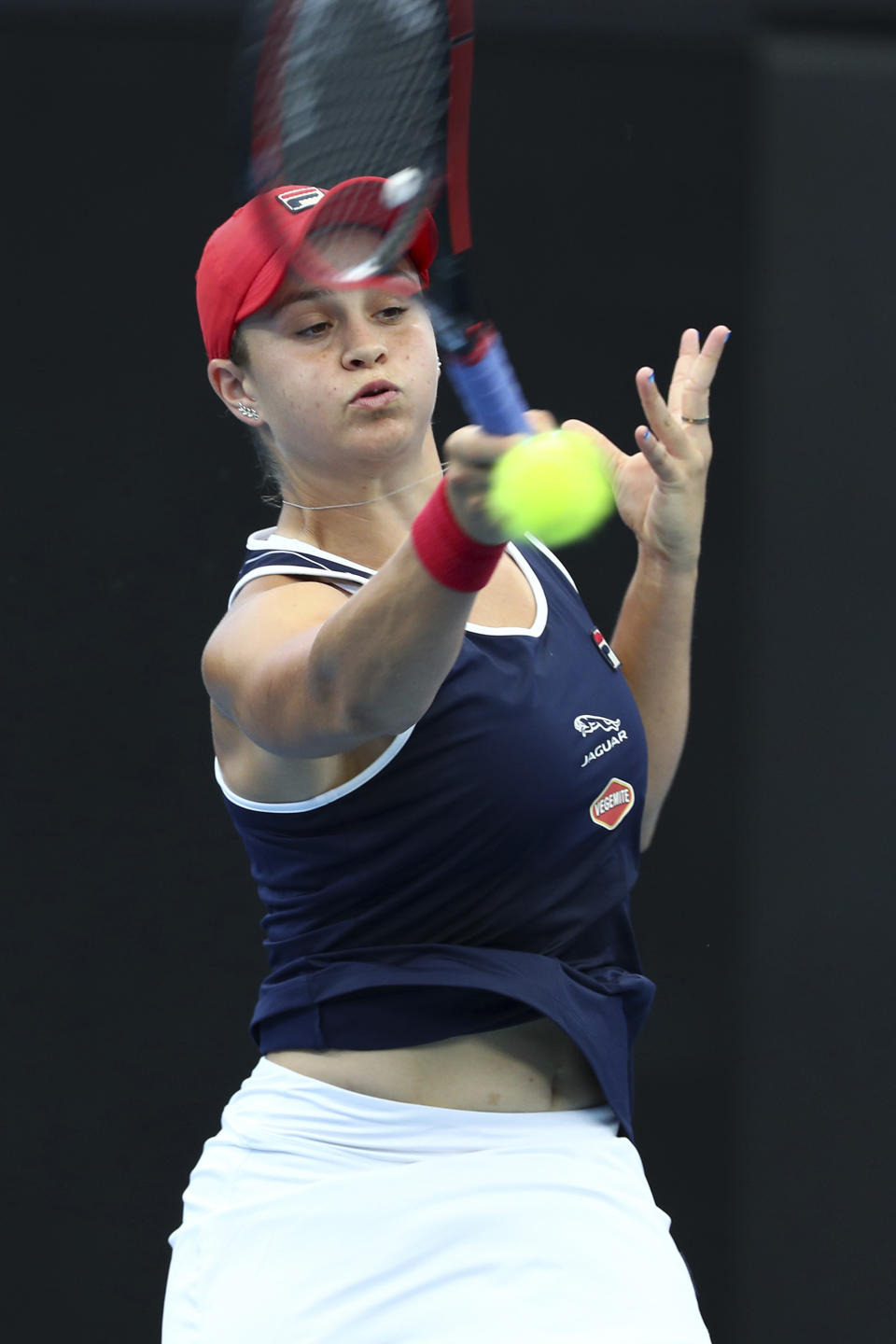 Ashleigh Barty of Australia plays a shot during her match against Jennifer Brady of the United States at the Brisbane International tennis tournament in Brisbane, Australia, Thursday, Jan. 9, 2020. (AP Photo/Tertius Pickard)