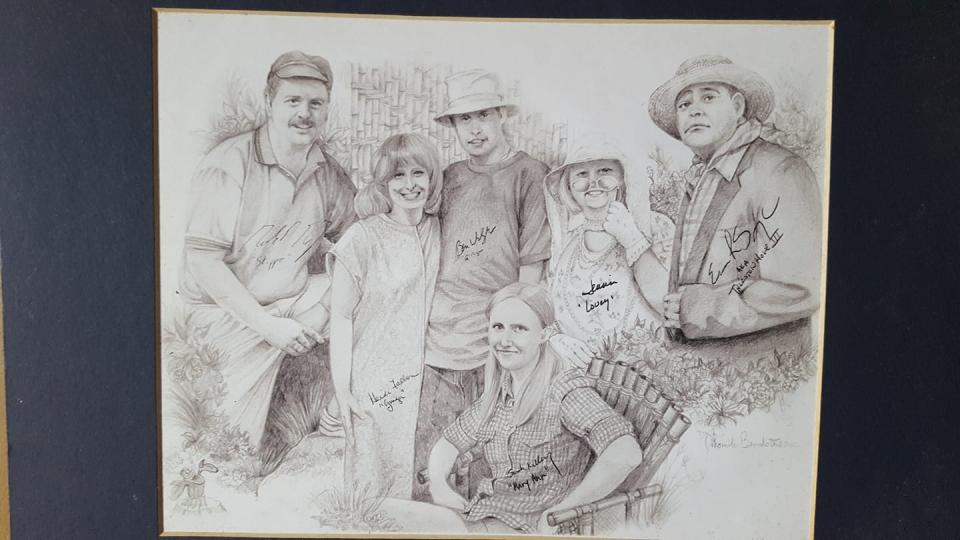 Thom VanBenschoten worked for the Community Press for decades. He drew this portrait of west office staffers with a Gilligan's Island theme. They are, from left: Mark Motz, Heidi Fallon, Ben Walpole, Sarah Kelley (seated), Jennie Key and Eric Spangler.