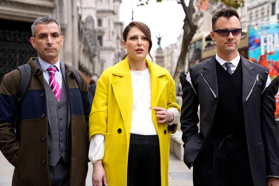 Simon Blake (left), Nicola Thorp and Colin Seymour (right) arriving at the Royal Courts Of Justice, central London (PA)