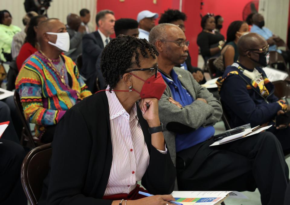 Community members listen to faith leaders, law enforcement and local officials at a crime prevention task force meeting at Bethel Family Life Center on Monday, Nov. 14, 2022.