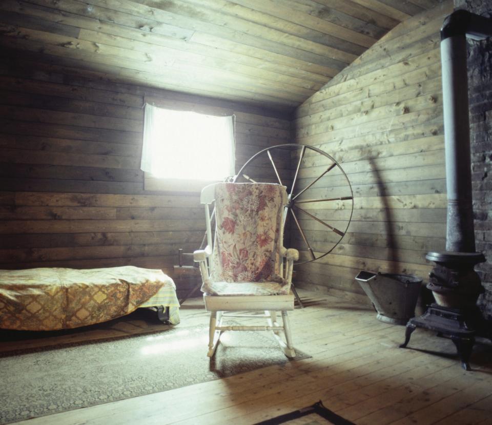 an empty rocking chair in a room