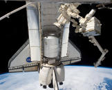 NASA space shuttle Atlantis' cargo bay holds the Raffaello multi-purpose logistics module seen from the International Space Station before the two spacecraft undocked July 18, 2011 in space. (NASA via Getty Images)