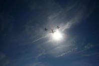 <p>Military planes fly over the Champs Elysees avenue during the traditional Bastille Day parade in Paris, France, Friday, July 14, 2017. (Photo: Kamil Zihnioglu/AP) </p>