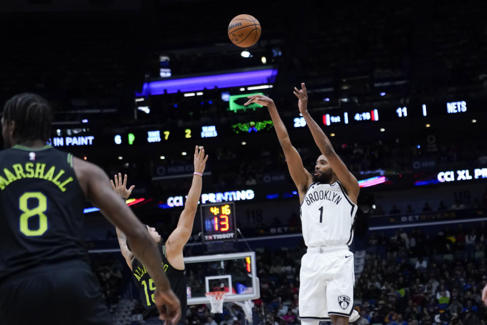 Brooklyn Nets forward Mikal Bridges (1) shoots against New Orleans Pelicans guard Jose Alvarado in the first half of an NBA basketball game in New Orleans, Tuesday, Jan. 2, 2024. (AP Photo/Gerald Herbert)