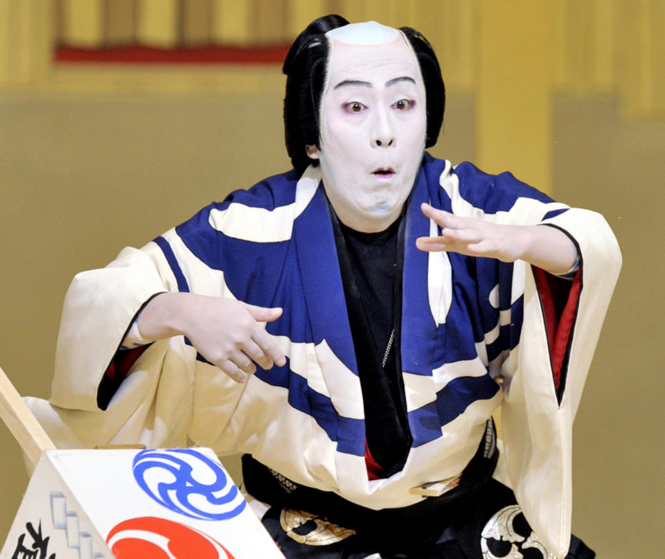 In this photo taken Sept. 2, 2011, Kabuki actor Kanzaburo Nakamura performs in a dance drama titled "Omatsuri" at the New Kabukiza theater in Osaka, Japan. Kanzaburo, who helped boost the popularity of the traditional Japanese art form, died Wednesday, Dec. 5, 2012. He was 57. (AP Photo/Kyodo News) NO ARCHIVE, ONE TIME USE ONLY, JAPAN OUT, MANDATORY CREDIT, NO LICENSING IN CHINA, FRANCE, HONG KONG, JAPAN AND SOUTH KOREA