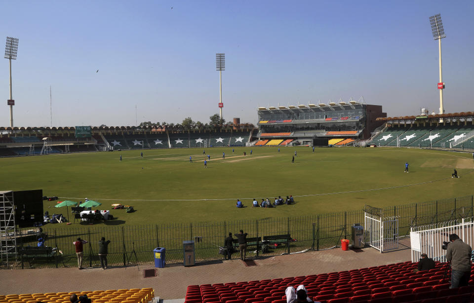 In this Monday, Feb. 17, 2020, photo, players of Multan Sultan cricket team attend a practice session at Gaddafi stadium in preparation for upcoming Pakistan Super League, in Lahore, Pakistan. Security concerns stopped foreign cricketers from touring Pakistan four years ago when the country's premier domestic Twenty20 tournament was launched, forcing organizers to stage the event on neutral turf in the United Arab Emirates. When the 2020 edition of the PSL starts in Karachi on Thursday, Darren Sammy of the West Indies and Shane Watson of Australia will be among 36 foreign cricketers involved in the six franchises. (AP Photo/K.M. Chaudary)