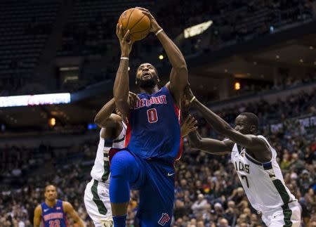 Dec 6, 2017; Milwaukee, WI, USA; Detroit Pistons center Andre Drummond (0) shoots during the fourth quarter against the Milwaukee Bucks at BMO Harris Bradley Center. Mandatory Credit: Jeff Hanisch-USA TODAY Sports