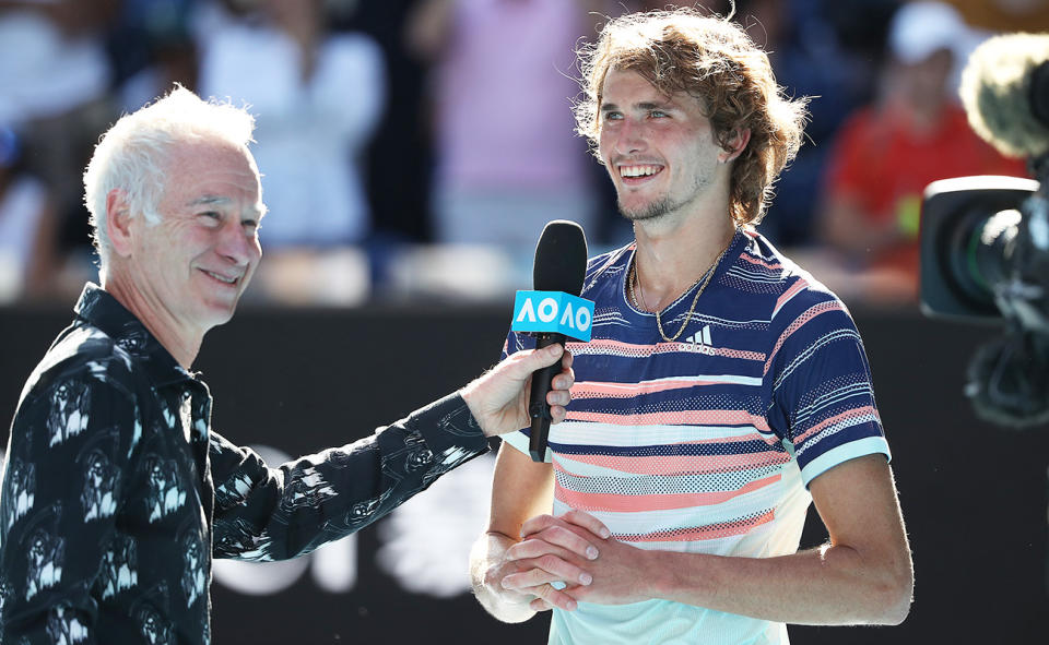 John McEnroe, pictured here interviewing Alexander Zverev at the Australian Open in 2020.