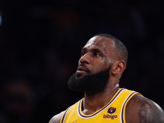 LeBron James looks up during a game in 2021.