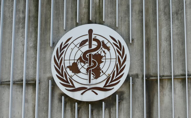 FILE PHOTO: A logo is pictured on the headquarters of the WHO in Geneva