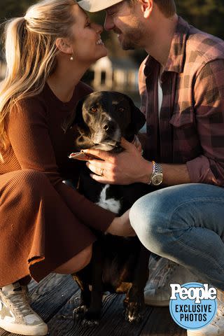 <p>courtesy Alex Doleac</p> Adam Doleac and wife MacKinnon with their dog, Remi