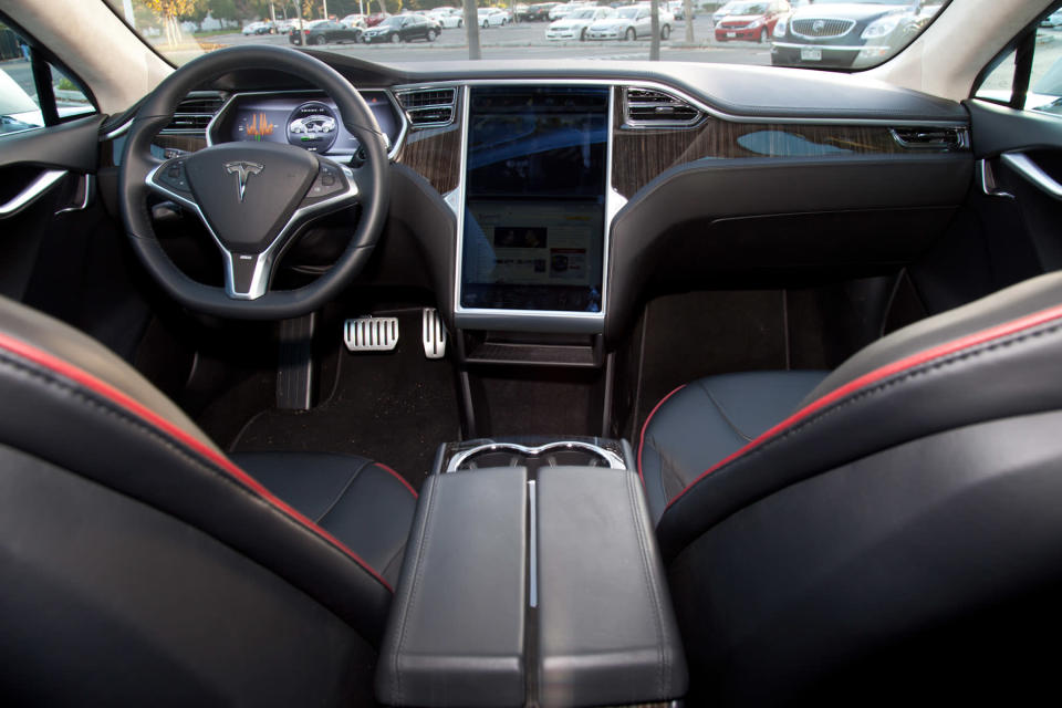 Inside, the Model S favors a modernist look.