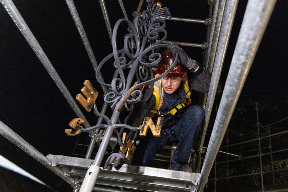 Walt Disney Imagineering installs an artisan-created weathervane atop a structure within Tiana’s Bayou Adventure at Magic Kingdom Park in Walt Disney World Resort in Lake Buena Vista, Fla on Jan. 5, 2024. The metal sculpture is the work of famed New Orleans master blacksmith, Darryl Reeves, and his apprentice, Karina Roca. Tiana’s Bayou Adventure, opening in 2024, will take guests on a musical adventure inspired by the beloved story and characters from the fan-favorite film “The Princess and the Frog.” (Olga Thompson, Photographer)