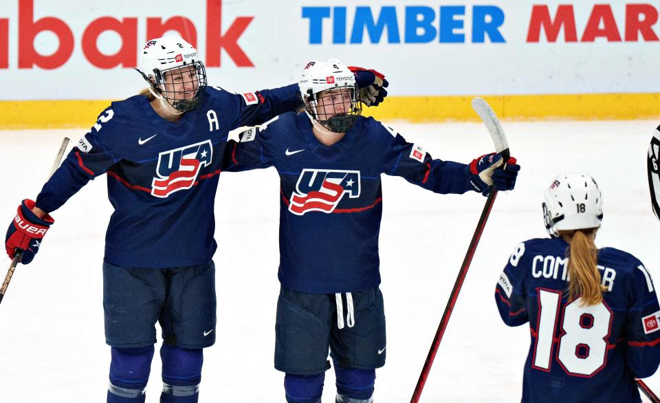 Caroline Harvey of USA (C) celebrates scoring the 9-1 goal during the women's IIHF Ice Hockey World Championship semi-final match between USA and Czech Republic in Herning, Denmark, on September 3, 2022.