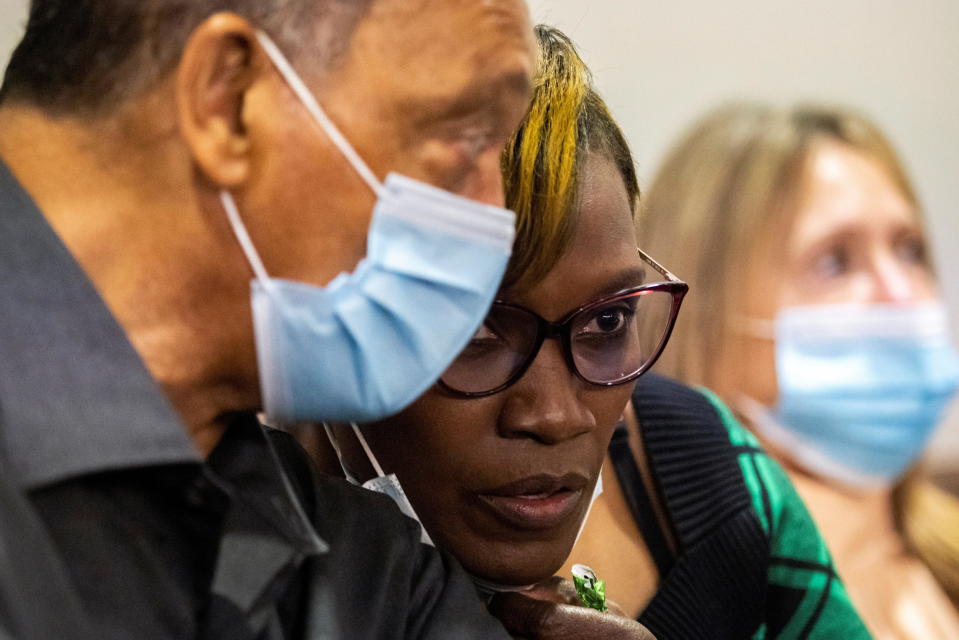 The Rev. Jesse Jackson, speaks with Ahmaud Arbery's mother, Wanda Cooper-Jones, during the trial of Greg McMichael, his son Travis McMichael and a neighbor, William 