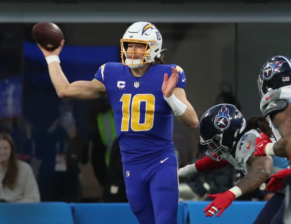 Chargers quarterback Justin Herbert passes against Tennessee.