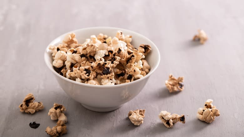 Burnt popcorn in a bowl