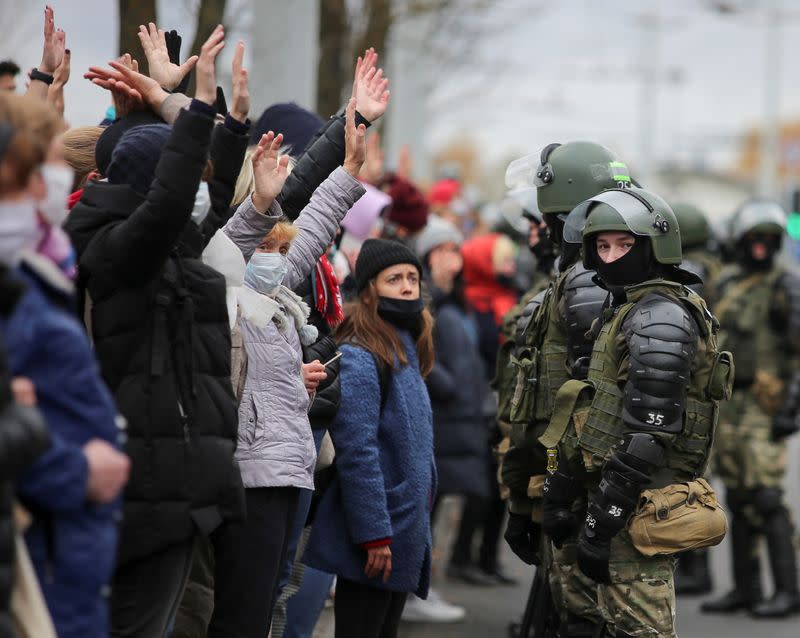 Belarusian opposition supporters hold a rally in Minsk